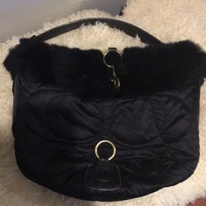 Black coach purse with fur trim